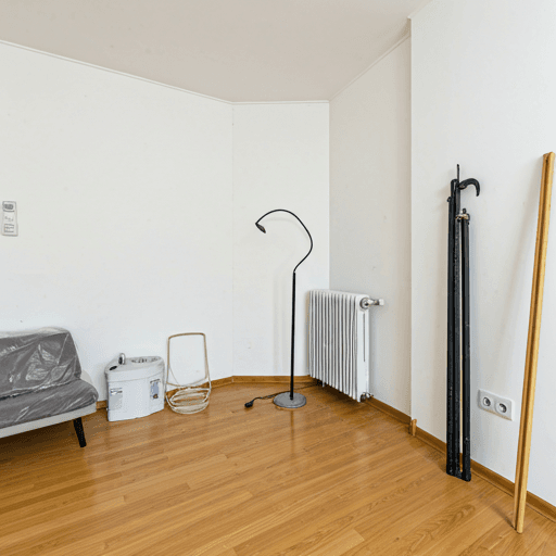 Cluttered room before renovation